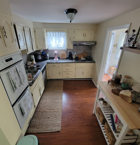 Included dishwasher, stove top and two ovens, fridge, microwave