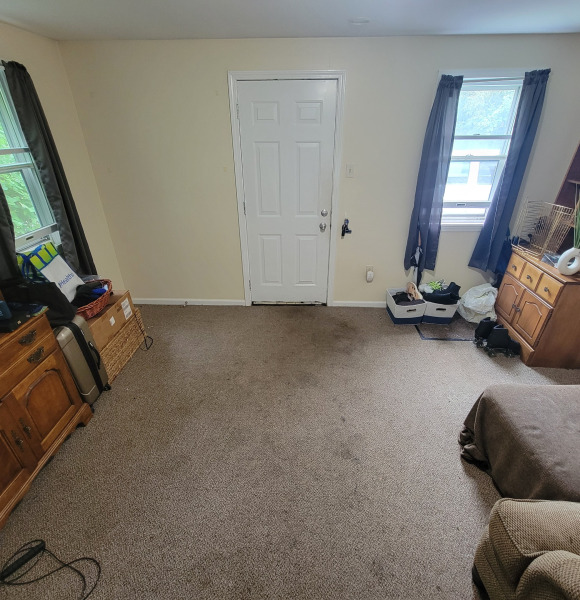 East unit's Den, facing back door